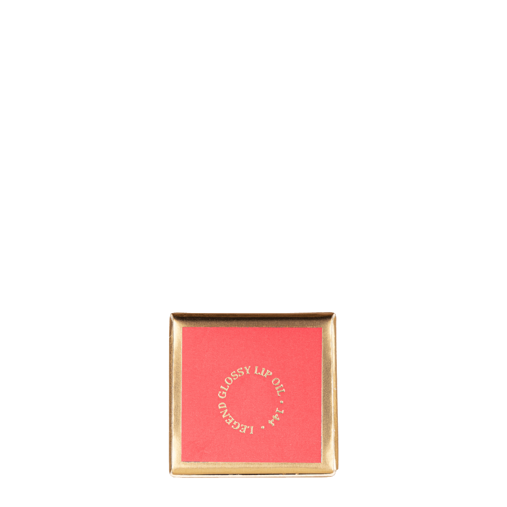 Legend Lip Oil product display showing elegant packaging and rich glossy formula for smooth lip hydration
