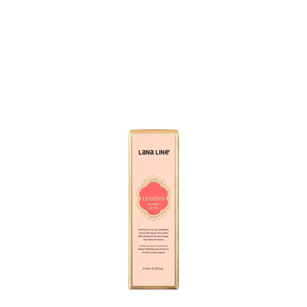 Close-up of Legend Lip Oil applicator showing smooth glossy texture and precision wand for easy application